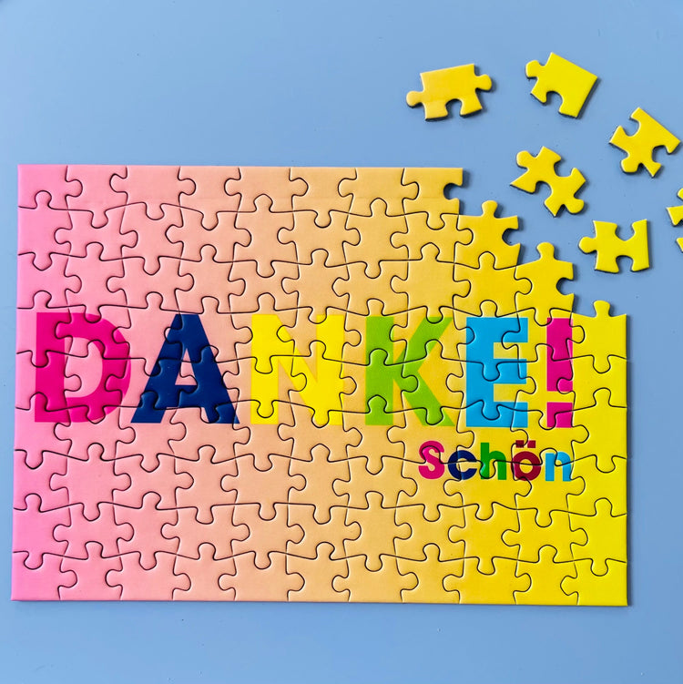 99 Teile Puzzle Postkarte
